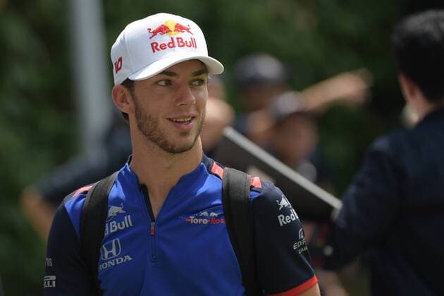 (180914) -- SINGAPORE, Sept. 14, 2018 -- Toro Rosso s French driver Pierre Gasly arrives at the pit for the practice sessions of the Formula One Singapore Grand Prix at the Marina Bay Street Circuit in Singapore on Sept. 14, 2018. )(wll) (SP)SINGAPORE-F1 ThenxChihxWey 