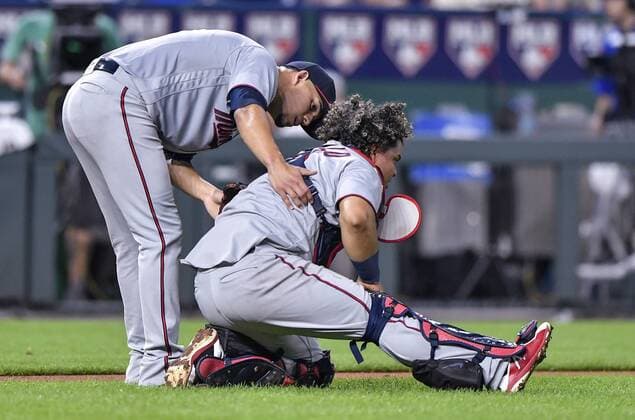 September 14, 2018 - Kansas City, MO, USA - Minnesota Twins starting pitcher Jose Berrios checks on catcher Willians Astudillo after throwing out the Kansas City Royals Ryan O Hearn at third on a bunt in the second inning on Friday, Sept. 14, 2018, at Kauffman Stadium in Kansas City, Mo. Minnesota at Kansas City - ZUMAm67_ 20180914_zaf_m67_022 Copyright: xJohnxSleezerx