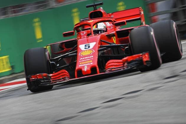 (180915) -- SINGAPORE, Sept. 15, 2018 -- Ferrari s driver Sebastian Vettel of Germany drives in the third practice session of the Formula One Singapore Grand Prix Night Race held at the Marina Bay Street Circuit in Singapore, on Sep 15, 2018. ) (SP)SINGAPORE-F1-SINGAPORE GRAND PRIX NIGHT RACE-PRACTISE ThenxChihxWey 