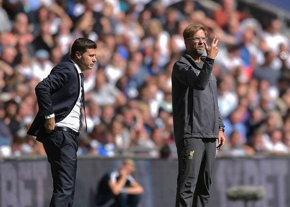 Jurgen Klopp manager of Liverpool and Mauricio Pochettino manager of Tottenham Hotspur during the Premier League match between Tottenham Hotspur and Liverpool at Wembley Stadium, London, England on 15 September 2018. Copyright: xVincexxMignottx PMI-2228-0068