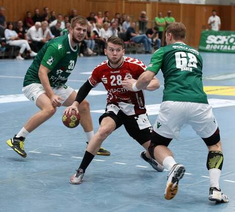 Michael Schulz DJK Rimpar Wolves Tim Claasen VfL Lübeck Schwartau Julian Sauer DJK Rimpar Wolves DKB 2 Handball Bundesliga DJK Rimpar Wolves VfL Lübeck Schwartau xfsx