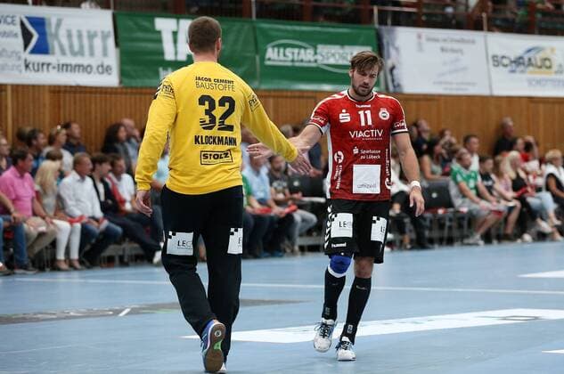 Dennis Klockmann VfL Lübeck Schwartau gossips with Markus Hansen VfL Lübeck Schwartau from DKB 2 Handball Bundesliga DJK Rimpar Wolves VfL Lübeck Schwartau xfsx
