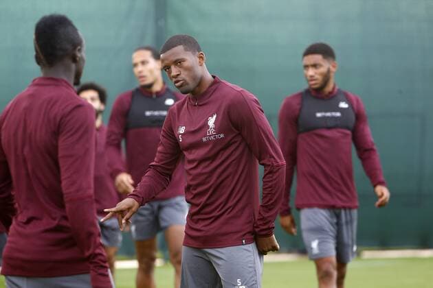 17th September 2018, Anfield, Liverpool, England; UEFA Champions League football, Liverpool versus Paris St Germain, open training session; Georginio Wijnaldum of Liverpool with Sadio Mane, Joe Gomez and Virgil van Dijk ahead of tomorrow s Champions League match against Paris Saint-Germain  ActionPlus12063490 AlanxMartin