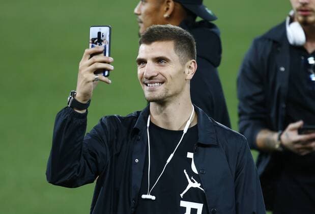 17th September 2018, Anfield, Liverpool, England; UEFA Champions League football, Liverpool versus Paris St Germain, open training session; Thomas Meunier of Paris Saint-Germain takes a selfie during tonight s pitch inspection at Anfield ahead of tomorrow s Champions League match against Liverpool  ActionPlus12063492 AlanxMartin