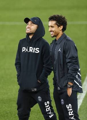 17th September 2018, Anfield, Liverpool, England; UEFA Champions League football, Liverpool versus Paris St Germain, open training session; Neymar and Marcos Marquinhos of Paris Saint-Germain share a joke during tonight s pitch inspection at Anfield ahead of tomorrow s Champions League match against Liverpool  ActionPlus12063497 AlanxMartin