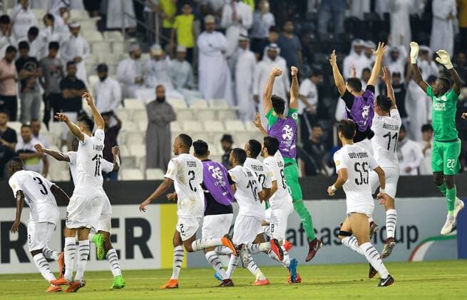 (180918) -- DOHA, Sept. 18, 2018 -- Al-Sadd s players celebrate after the AFC Asian Champions League quarterfinal second leg football match between Qatar s Al Sadd and Iran s Esteghlal FC in Doha, capital of Qatar, Sept. 17, 2018. Al Sadd was qualified for the semifinal after a 2-2 draw in the second leg of the quarterfinal with Esteghlal FC gave them a 5-3 aggregate win. ) (SP)QATAR-DOHA-FOOTBALL-AFC-ASIAN CHAMPIONS LEAGUE Nikku 