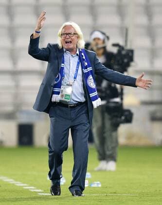 (180918) -- DOHA, Sept. 18, 2018 -- Esteghlal FC s head coach Winfried Schafer reacts during the AFC Asian Champions League quarterfinal second leg football match between Qatar s Al Sadd and Iran s Esteghlal FC in Doha, capital of Qatar, Sept. 17, 2018. Al Sadd was qualified for the semifinal after a 2-2 draw in the second leg of the quarterfinal with Esteghlal FC gave them a 5-3 aggregate win. ) (SP)QATAR-DOHA-FOOTBALL-AFC-ASIAN CHAMPIONS LEAGUE Nikku 