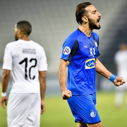 (180918) -- DOHA, Sept. 18, 2018 -- Rouhollah Bagheri (R) of Esteghlal FC celebrates after scoring the second goal during the AFC Asian Champions League quarterfinal second leg football match between Qatar s Al Sadd and Iran s Esteghlal FC in Doha, capital of Qatar, Sept. 17, 2018. Al Sadd was qualified for the semifinal after a 2-2 draw in the second leg of the quarterfinal with Esteghlal FC gave them a 5-3 aggregate win. ) (SP)QATAR-DOHA-FOOTBALL-AFC-ASIAN CHAMPIONS LEAGUE Nikku 
