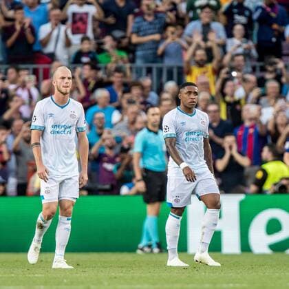 BARCELONA, 18-09-2018, Stadium Nou Camp, season 2018 2019, Champions League football. PSV midfielder Jorrit Hendrix (LL) and PSV forwarder Steven Bergwijn (L) dejected after Barcelona player Lionel Messi (NOT IN PHOTO) scored 1-0 during the game FC Barcelona Barca - PSV. Barcelona - PSV  x2474661x