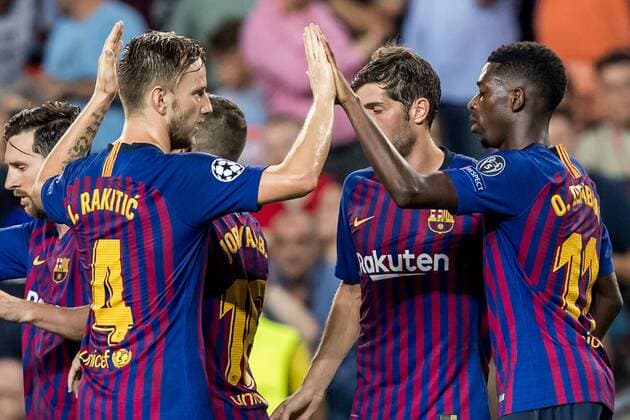 BARCELONA, 18-09-2018, Stadium Nou Camp, season 2018 2019, Champions League football. Barcelona player Ivan Rakitic (L) and Barcelona player Ousmane Dembele (R) (C) celebrating during the game FC Barcelona Barca - PSV (4-0). Barcelona - PSV  x2475069x