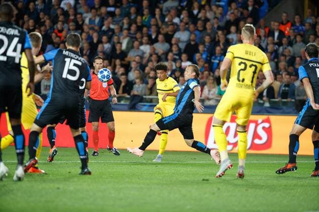 Dortmund s Jadon Sancho and Club s Ruud Vormer fight for the ball during a game between Belgian soccer team Club Brugge KV and German club Borussia Dortmund, in Brugge, Tuesday 18 September 2018, day one of the UEFA Champions League, in group A. KURTxDESPLENTER  x05428686x