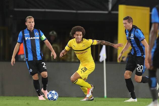 Club s Ruud Vormer, Dortmund s Axel Witsel and Club s Hans Vanaken fight for the ball during a game between Belgian soccer team Club Brugge KV and German club Borussia Dortmund, in Brugge, Tuesday 18 September 2018, day one of the UEFA Champions League, in group A. BRUNOxFAHY  x05428691x
