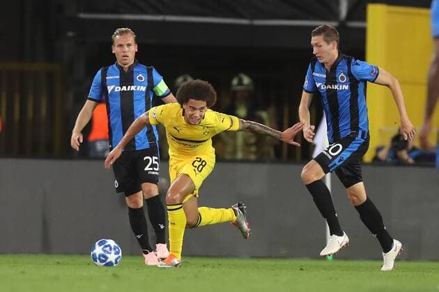 Club s Ruud Vormer, Dortmund s Axel Witsel and Club s Hans Vanaken fight for the ball during a game between Belgian soccer team Club Brugge KV and German club Borussia Dortmund, in Brugge, Tuesday 18 September 2018, day one of the UEFA Champions League, in group A. BRUNOxFAHY  x05428694x