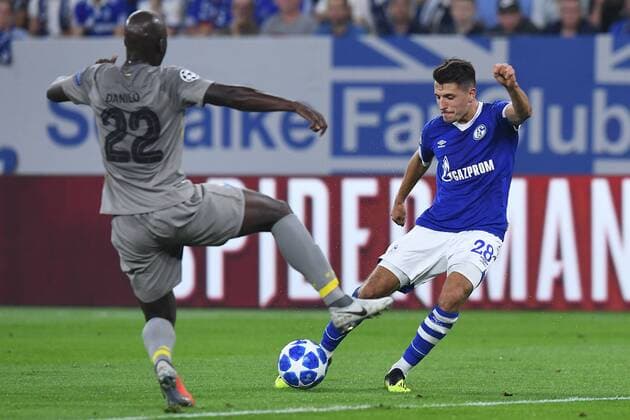 Football Champions League Group Stage 1 Gameday FC Schalke 04 FC Porto on 18 09 2018 in the Veltins Arena in Gelsenkirchen Danilo Porto left Alessandro Schöpf Schalke right DFL Regulations prohibit any use of images as image sequences or quasi video xRx
