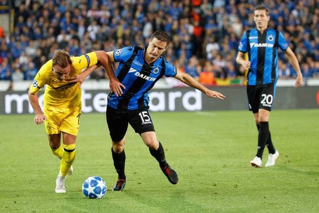 Dortmund s Mario Gotze and Club s Matej Mitrovic fight for the ball during a game between Belgian soccer team Club Brugge KV and German club Borussia Dortmund, in Brugge, Tuesday 18 September 2018, day one of the UEFA Champions League, in group A. KURTxDESPLENTER  x05428706x