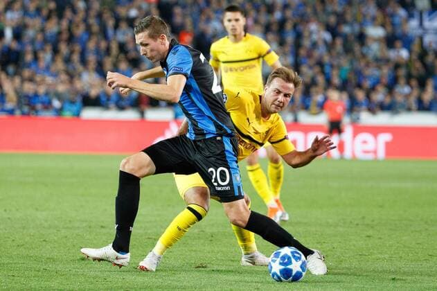 Club s Hans Vanaken and Dortmund s Mario Gotze fight for the ball during a game between Belgian soccer team Club Brugge KV and German club Borussia Dortmund, in Brugge, Tuesday 18 September 2018, day one of the UEFA Champions League, in group A. KURTxDESPLENTER  x05428712x
