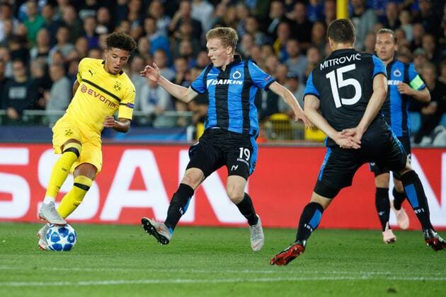 Dortmund s Jadon Sancho and Club s Thibault Vlietinck fight for the ball during a game between Belgian soccer team Club Brugge KV and German club Borussia Dortmund, in Brugge, Tuesday 18 September 2018, day one of the UEFA Champions League, in group A. KURTxDESPLENTER  x05428729x
