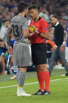 GER FC Schalke 04 GER vs FC Porto POR 18 09 2018 Veltins Arena Gelsenkirchen Championsleque Preliminary Round GER FC Schalke 04 GER vs FC Porto POR DFL regulations prohibit any use of photographs picture sequences referee referee Jesus Gil Manzano ESP calls for a serious conversation with Alex Telles FC Porto 13 nordphotox xMeuter nph00351