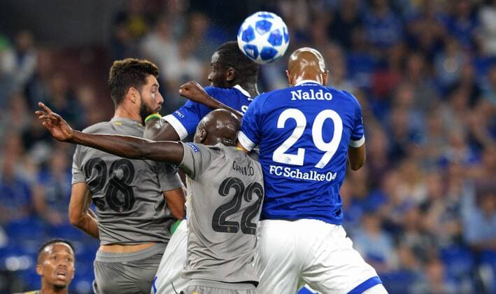 Football UEFA Champions League Mens Season 2018 2019 Group D 1 Gameday VELTINS Arena Gelsenkirchen FC Schalke 04 S04 blue FC Porto gray Naldo S04 Salif Sane S04 Danilo FCP Felipe FCP action UEFA REGULATIONS PROHIBIT ANY USE OF PHOTOGRAPH AS IMAGE SEQUENCES AND OR QUASI VIDEO