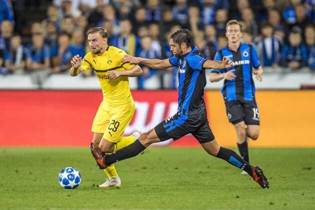 Football Champions League Season 2018 2019 Group Stage 1 Gameday Club Bruges Borussia Dortmund on 18 09 2018 in Jan Breydel Stadium in Bruges Belgium Dortmunds Marcel Schmelzer l and Bruges Benoit Poulain fight for the ball DFL REGULATIONS PROHIBIT ANY USE OF PHOTOGRAPH AS IMAGE SEQUENCES AND OR QUASI VIDEO Copyright: xKirchner DavidxInderliedx