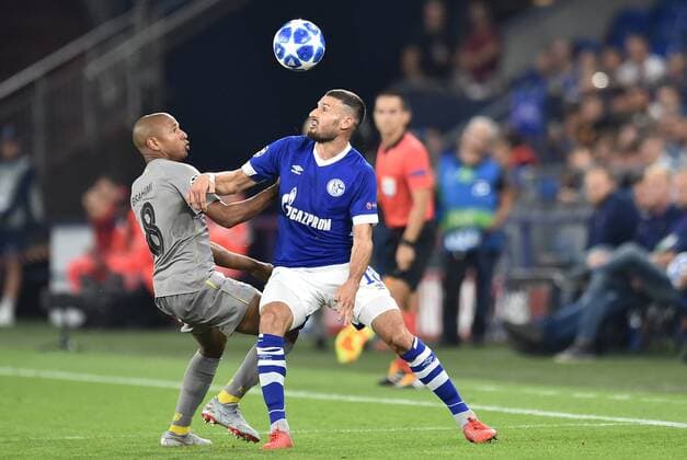 Football Champions League Group Stage 1 Gameday FC Schalke 04 FC Porto on 18 09 2018 in the Veltins Arena in Gelsenkirchen Yacine Brahimi Porto on the left Daniel Caligiuri Schalke on the right DFL Regulations prohibit any use of images or video sequences xTTx
