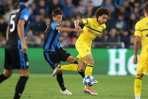 Club s Jelle Vossen and Dortmund s Axel Witsel fight for the ball during a game between Belgian soccer team Club Brugge KV and German club Borussia Dortmund, in Brugge, Tuesday 18 September 2018, day one of the UEFA Champions League, in group A. BRUNOxFAHY  x05428747x