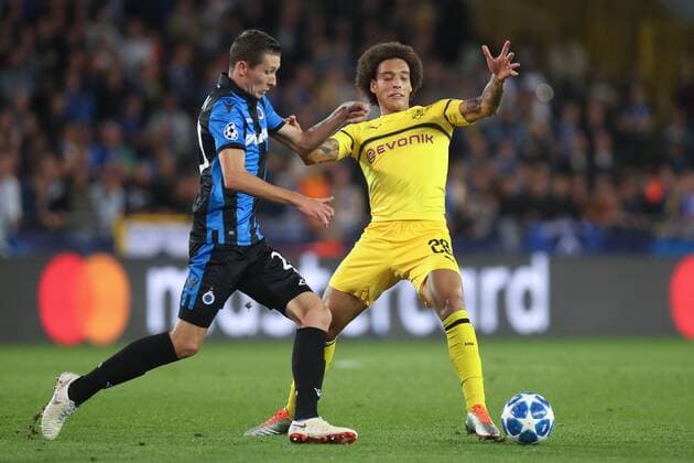 Club s Hans Vanaken and Dortmund s Axel Witsel fight for the ball during a game between Belgian soccer team Club Brugge KV and German club Borussia Dortmund, in Brugge, Tuesday 18 September 2018, day one of the UEFA Champions League, in group A. BRUNOxFAHY  x05428752x
