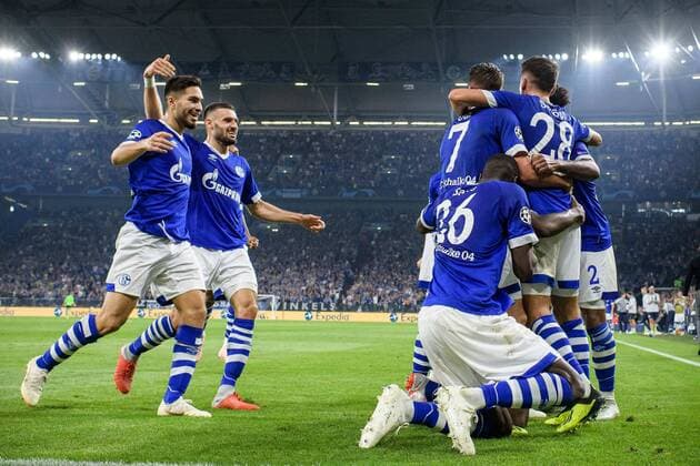 Schalker Torjubel to 1 0 by Breel Embolo FC Schalke 04 36 covered with Suat Serdar FC Schalke 04 8 and Daniel Caligiuri FC Schalke 04 18 in the Champions League match between FC Schalke 04 and FC Porto on 18 09 2018 FC Schalke 04 vs FC Porto Champions League Group Stage 18 09 2018 Gelsenkirchen Copyright: xSchuelerx xEibnerx-xPressefotox EP_EER