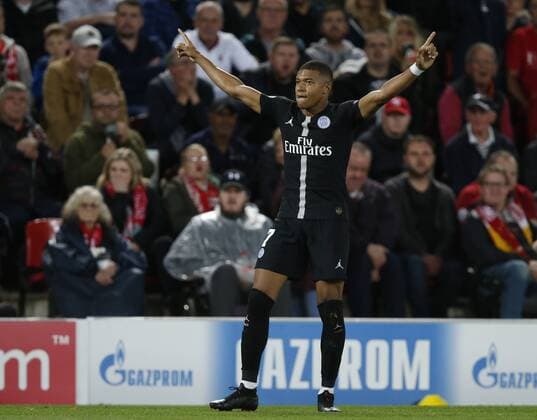 PSG forward Kylian Mbappe celebrates scoring their second goal during the UEFA Champions League - Group C match at the Anfield Stadium, Liverpool. Picture date 18th September 2018. Picture credit should read: Andrew Yates Sportimage EDITORIAL USE ONLY. No use with unauthorised audio, video, data, fixture lists, club league logos or live services. Online in-match use limited to 120 images, no video emulation. No use in betting, games or single club league player publications.