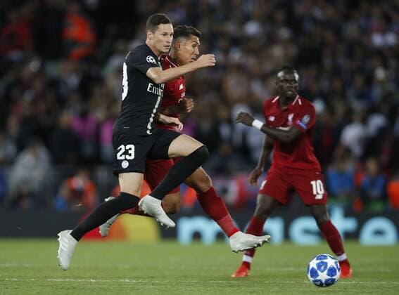 PSG forward Julian Draxler challenged by Liverpool forward Roberto Firmino during the UEFA Champions League - Group C match at the Anfield Stadium, Liverpool. Picture date 18th September 2018. Picture credit should read: Andrew Yates Sportimage EDITORIAL USE ONLY. No use with unauthorised audio, video, data, fixture lists, club league logos or live services. Online in-match use limited to 120 images, no video emulation. No use in betting, games or single club league player publications.
