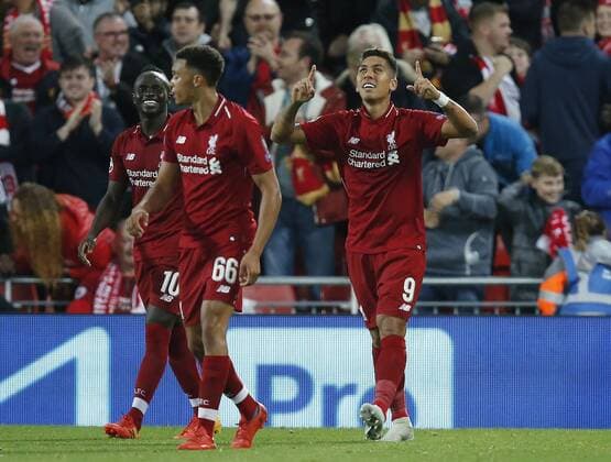 Liverpool forward Roberto Firmino celebrates celebrating scoring the third and winning goal during the UEFA Champions League - Group C match at the Anfield Stadium, Liverpool. Picture date 18th September 2018. Picture credit should read: Andrew Yates Sportimage EDITORIAL USE ONLY. No use with unauthorised audio, video, data, fixture lists, club league logos or live services. Online in-match use limited to 120 images, no video emulation. No use in betting, games or single club league player publications.