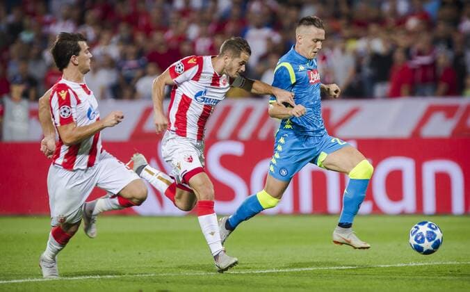 18th September 2018, Rajko Mitic Stadium, Belgrade, Serbia; UEFA Champions League football, Red Star Belgrade versus Napoli; Piotr Zielinski of Napoli comes forward on the ball chased by Goran Causic and Filip Stojkovic of Red Star Belgrade  ActionPlus12063689 NikolaxKrstic