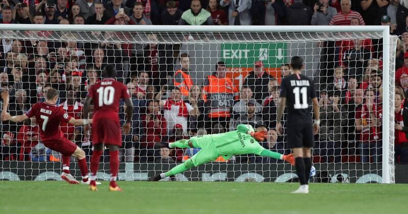 Football - 2018 2019 UEFA Champions League - Group C: Liverpool vs. Paris Saint-Germain James Milner of Liverpool scores a penalty at Anfield. COLORSPORT LYNNE CAMERON 
