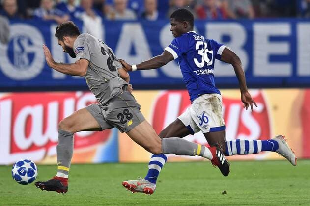 Football Champions League Group Stage 1 Gameday FC Schalke 04 FC Porto on 18 09 2018 in the Veltins Arena in Gelsenkirchen Felipe Porto on the left Breel Embolo Schalke on the right DFL Regulations prohibit any use of images as image sequences or quasi video xTTx