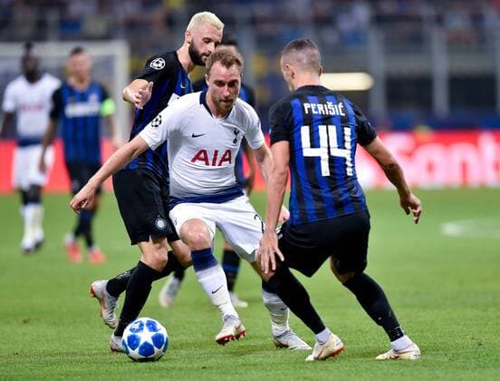 September 18, 2018 - Christian Eriksen of Tottenham Hotspur is challenged by Ivan Perisic of Inter Milan during the UEFA Champions League Group B match between Inter Milan and Tottenham Hotspur at Stadio San Siro, Milan, Italy on 18 September 2018. Giuseppe Maffia. Soccer: Champions League - Inter Milan v Tottenham - ZUMAa181 20180918_zaa_a181_063 Copyright: xAFP7x
