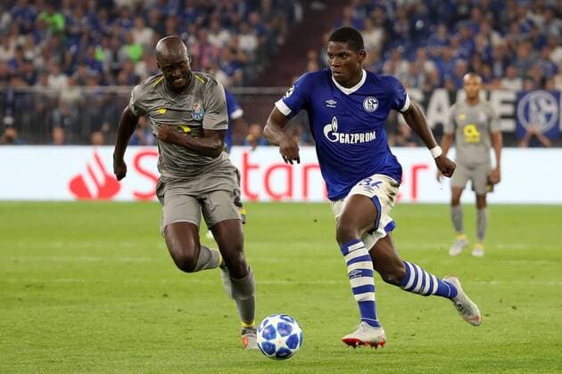 (180919) -- GELSENKIRCHEN, Sept. 19, 2018 -- Breel Embolo (R) of Schalke 04 competes during the UEFA Champions League football match between Schalke 04 and FC Porto at the Veltins Arena on Sept. 18, 2018 in Gelsenkirchen, Germany. The match ended 1-1. ) (SP)GERMANY-GELSENKIRCHEN-FOOTBALL-UEFA CHAMPIONS LEAGUE JoachimxBywaletz 