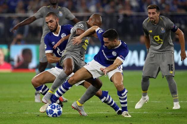 (180919) -- GELSENKIRCHEN, Sept. 19, 2018 -- Brahimi (3rd R) of Porto competes during the UEFA Champions League football match between Schalke 04 and FC Porto at the Veltins Arena on Sept. 18, 2018 in Gelsenkirchen, Germany. The match ended 1-1. ) (SP)GERMANY-GELSENKIRCHEN-FOOTBALL-UEFA CHAMPIONS LEAGUE JoachimxBywaletz 