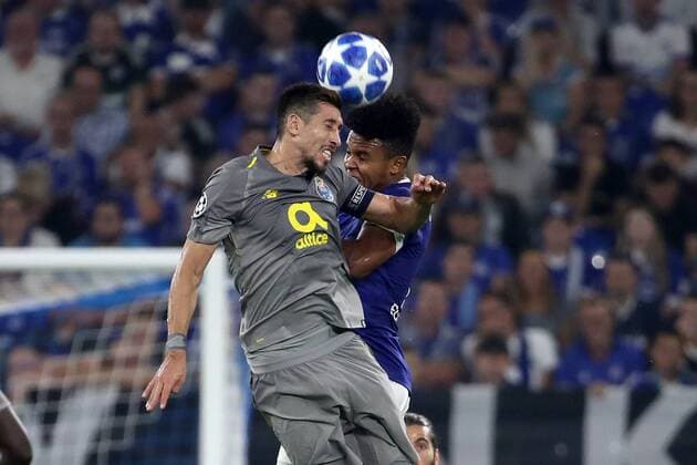 (180919) -- GELSENKIRCHEN, Sept. 19, 2018 -- Weston McKennie (R) of Schalke 04 vies with Herrera of Porto during the UEFA Champions League football match between Schalke 04 and FC Porto at the Veltins Arena on Sept. 18, 2018 in Gelsenkirchen, Germany. The match ended 1-1. ) (SP)GERMANY-GELSENKIRCHEN-FOOTBALL-UEFA CHAMPIONS LEAGUE JoachimxBywaletz 