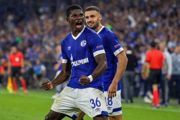 (180919) -- GELSENKIRCHEN, Sept. 19, 2018 -- Breel Embolo (L) of Schalke 04 celebrates during the UEFA Champions League football match between Schalke 04 and FC Porto at the Veltins Arena on Sept. 18, 2018 in Gelsenkirchen, Germany. The match ended 1-1. ) (SP)GERMANY-GELSENKIRCHEN-FOOTBALL-UEFA CHAMPIONS LEAGUE JoachimxBywaletz 