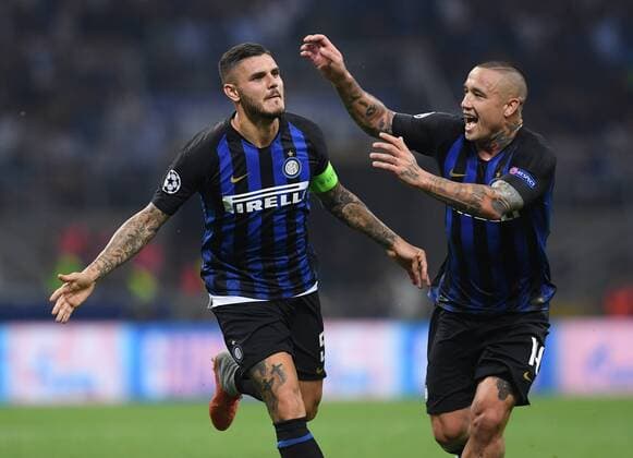 (180919) -- MILAN, Sept. 19, 2018 -- Inter Milan s Mauro Icardi (L) celebrates during a UEFA Champions League group B match between FC Inter and Tottenham Hotspur, in Milan, Italy, Sept. 18, 2018. FC Inter won 2-1.) (SP)ITALY-MILAN-UEFA CHAMPIONS LEAGUE-INTER-HOTSPUR AlbertoxLingria 