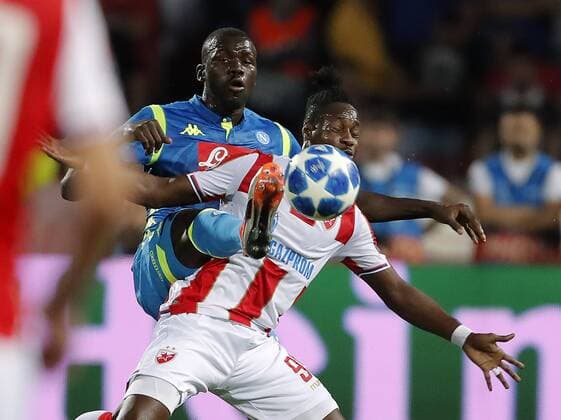 (180919) -- BELGRADE, Sept. 19, 2018 -- Crvena Zvezda s Richmond Boakye (R) vies with Napoli s Kalidou Koulibaly during an UEFA Champions League group C match between Crvena Zvezda and Napoli in Belgrade, Serbia, on Sept. 18, 2018. The match ended 0-0. ) (SP)SERBIA-BELGRADE-UEFA CHAMPIONS LEAGUE-CRVENA ZVEZDA-NAPOLI PredragxMilosavljevic 