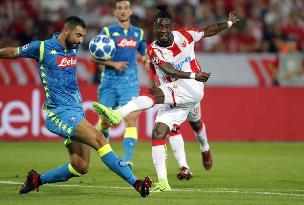 (180919) -- BELGRADE, Sept. 19, 2018 -- Crvena Zvezda s Richmond Boakye (R) vies with Napoli s Raul Albiol during a UEFA Champions League group C match between Crvena Zvezda and Napoli in Belgrade, Serbia, on Sept. 18, 2018. The match ended 0-0. ) (SP)SERBIA-BELGRADE-UEFA CHAMPIONS LEAGUE-CRVENA ZVEZDA-NAPOLI PredragxMilosavljevic 