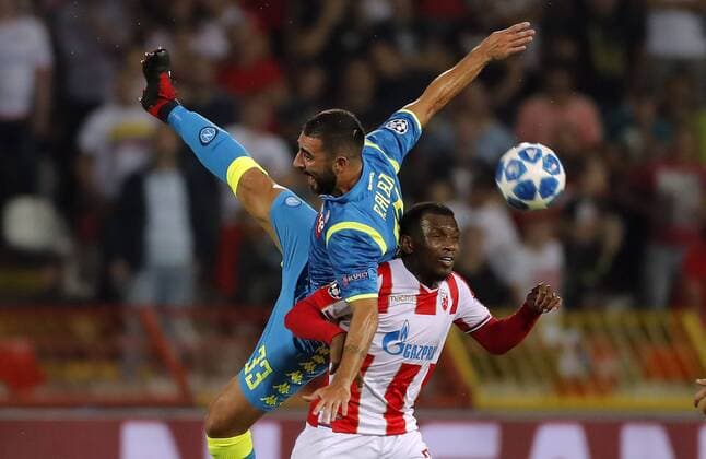 (180919) -- BELGRADE, Sept. 19, 2018 -- Crvena Zvezda s El Fardou Ben Nabouhane (R) vies with Napoli s Raul Albiol during a UEFA Champions League group C match between Crvena Zvezda and Napoli in Belgrade, Serbia, on Sept. 18, 2018. The match ended 0-0. ) (SP)SERBIA-BELGRADE-UEFA CHAMPIONS LEAGUE-CRVENA ZVEZDA-NAPOLI PredragxMilosavljevic 