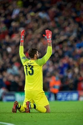 Sport Bilder des Tages (180919) -- LIVERPOOL, Sept. 19, 2018 -- Liverpool s goalkeeper Alisson Becker celebrates during the UEFA Champions League Group C match between Liverpool and Paris Saint-Germain at Anfield Stadium in Liverpool, Britain on Sept. 18, 2018. Liverpool won 3-2. FOR EDITORIAL USE ONLY. NOT FOR SALE FOR MARKETING OR ADVERTISING CAMPAIGNS. NO USE WITH UNAUTHORIZED AUDIO, VIDEO, DATA, FIXTURE LISTS, CLUB LEAGUE LOGOS OR LIVE SERVICES. ONLINE IN-MATCH USE LIMITED TO 45 IMAGES, NO VIDEO EMULATION. NO USE IN BETTING, GAMES OR SINGLE CLUB LEAGUE PLAYER PUBLICATIONS. (SP)BRITAIN-LIVERPOOL-FOOTBALL-UEFA CHAMPIONS LEAGUE-LIVERPOOL VS PSG HanxYan