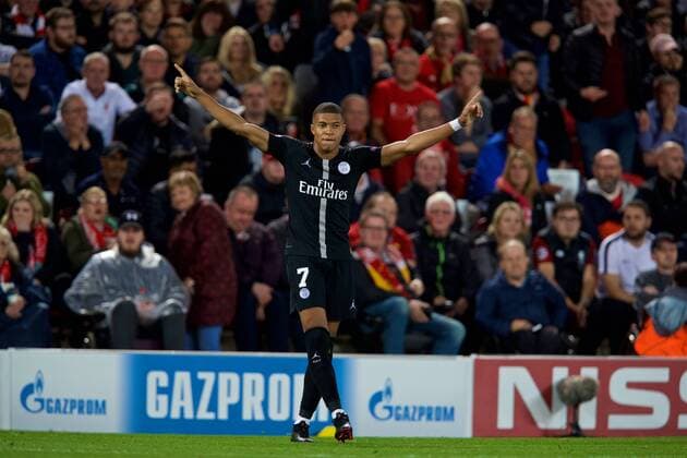 (180919) -- LIVERPOOL, Sept. 19, 2018 -- Paris Saint-Germain s Kylian Mbappe celebrates scoring during the UEFA Champions League Group C match between Liverpool and Paris Saint-Germain at Anfield Stadium in Liverpool, Britain on Sept. 18, 2018. Liverpool won 3-2. FOR EDITORIAL USE ONLY. NOT FOR SALE FOR MARKETING OR ADVERTISING CAMPAIGNS. NO USE WITH UNAUTHORIZED AUDIO, VIDEO, DATA, FIXTURE LISTS, CLUB LEAGUE LOGOS OR LIVE SERVICES. ONLINE IN-MATCH USE LIMITED TO 45 IMAGES, NO VIDEO EMULATION. NO USE IN BETTING, GAMES OR SINGLE CLUB LEAGUE PLAYER PUBLICATIONS. (SP)BRITAIN-LIVERPOOL-FOOTBALL-UEFA CHAMPIONS LEAGUE-LIVERPOOL VS PSG HanxYan
