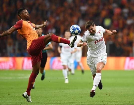 (180919) -- ISTANBUL, Sept. 19, 2018 -- Grzegorz Krychowlak(R) of Lokomotiv Moscow vies with Ryan Donk of Galatasaray during the 2018-2019 UEFA Champions League Group D match between Turkey s Galatasaray and Russia s Lokomotiv Moscow in Istanbul, Turkey, on Sept. 18, 2018. Galatasaray won 3-0. ) (SP)TURKEY-ISTANBUL-SOCCER-UEFA CHAMPIONS LEAGUE-GALATASARAY VS LOKOMOTIV MOSCOW HexCanling 
