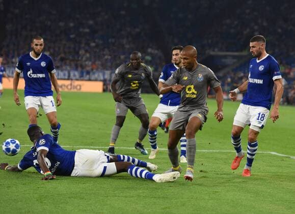 CL FC Schalke 04 FC Porto 18 09 2018 Salif Sané Schalke action in front of Yacine Brahimi Porto DFL REGULATIONS PROHIBIT ANY US PHOTOGRAPH AS IMAGE SEQUENCES AND OR QUASI VIDEO HM