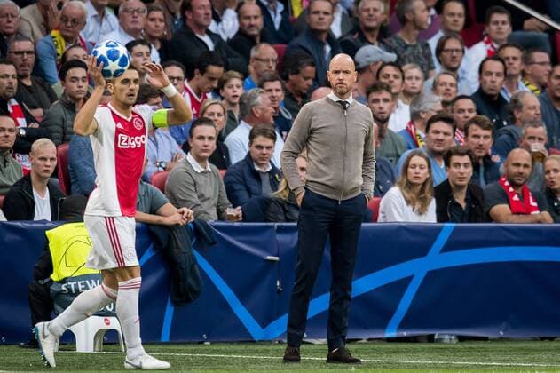 (L-R) Dusan Tadic of Ajax, coach Erik ten Hag of Ajax during the UEFA Champions League group E match between Ajax Amsterdam and AEK FC at the Johan Cruijff Arena on September 19, 2018 in Amsterdam, The Netherlands UEFA Champions League 2018 2019 xVIxVIxImagesx xRonaldxBonestrooxIVx 12172477