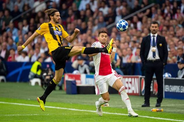 Amsterdam Netherlands 19 09 2018 UEFA Champions League 2018 19 Season Preliminary Round Group Stage Group E 1 Gameday Ajax Amsterdam AEK Athens Marios Oikonomou AEK Athens and Dusan Tadic Ajax Amsterdam in DeFodi001