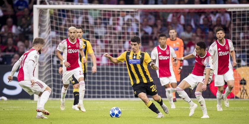 AMSTERDAM, AFC Ajax - AEK Athens FC, football, Champions League, season 2018-2019, 19-09-2018, Stadium Johan Cruijff Arena, AEK Athens player Petros Mantalos (M) surrounded by Ajax players Ajax - AEK Athens  x2476630x